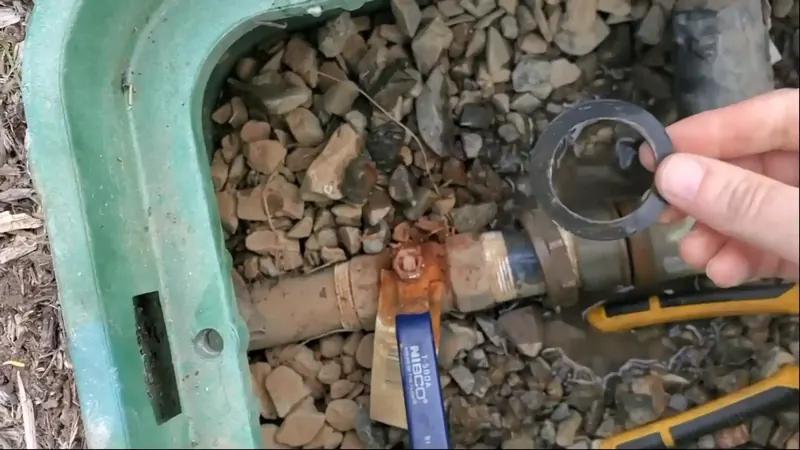 Irrigation sprinkler head and lateral supply connection inspected in a Commerce City master-planned community yard